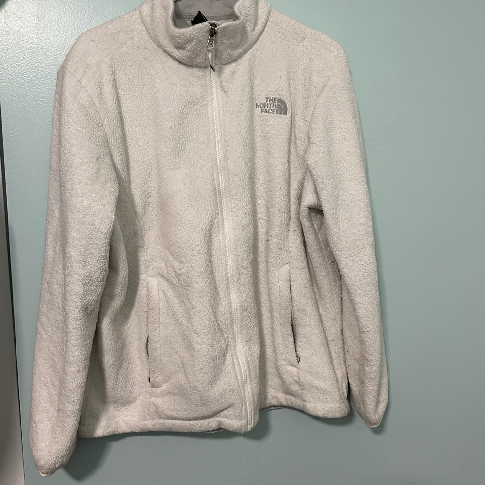 White North Face jacket.  Moderately loved 🤍